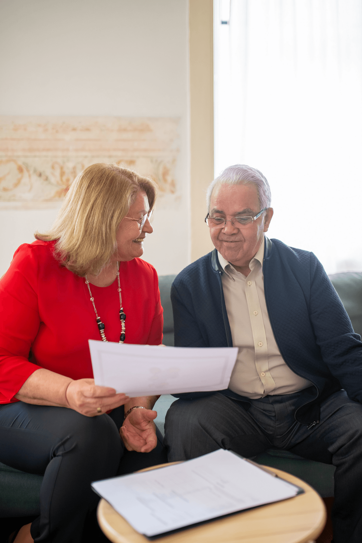 A Medicare On Main advisor comparing Medigap and Medicare Advantage options with a couple in their mid-60s