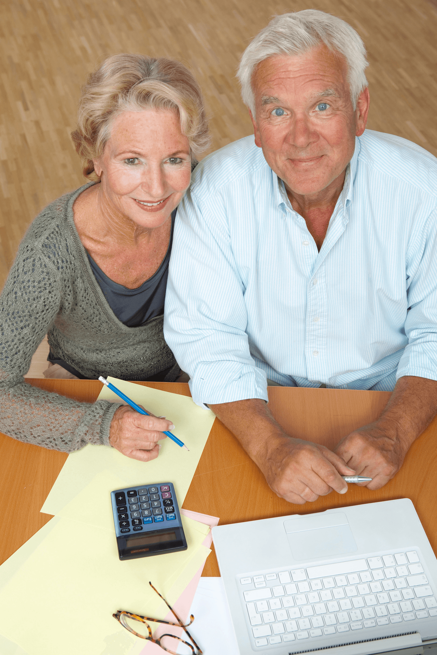 A Medicare On Main advisor helping a couple in their mid-60s review Medicare enrollment in Grand Junction, Colorado